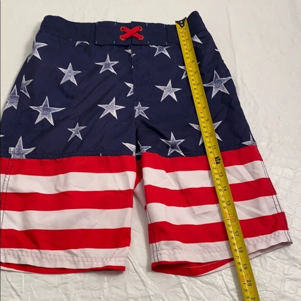 Cat and Jack American Flag red white blue swim trunks L = 12-14